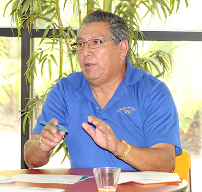 Raul Salinas of St. Vincent Church in Margate shares his maintenance concerns at the Earth Day Facility Training Seminar held by the Building and Property Office at the Archdiocese of Miami.