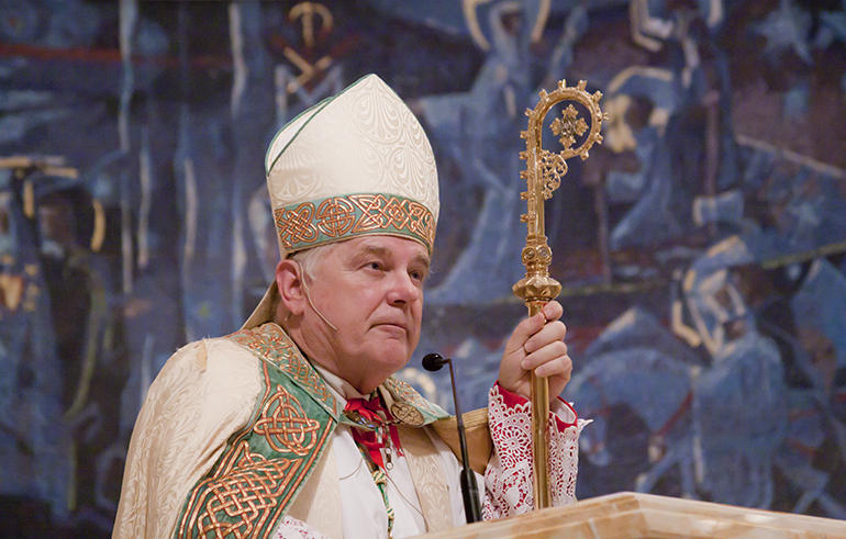 Archbishop Thomas Wenski gives the homily at the prayer vigil for peace in the Middle East, which took place Sunday, April 26, at St. Mary Cathedral.