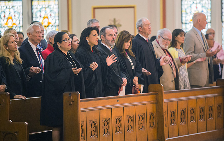 Taking part in the Red Mass at Gesu Church, front row, from left: Circuit Judge Bertila Soto, Circuit Judge Beatrice Butchko, Circuit Judge Milton Hirsch, Circuit Judge Samantha Ruiz-Cohen, Appeals Court Judge Vance Salter, Circuit Judge Jorge Rodriguez-Chomat.