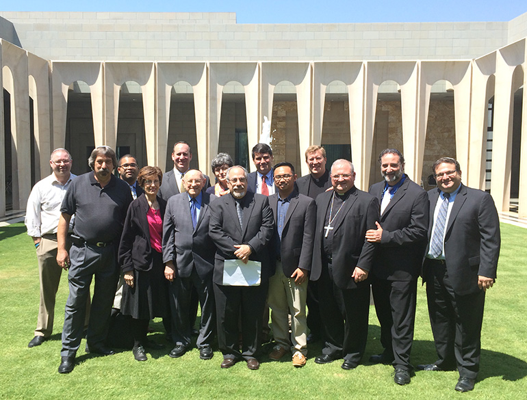 The Florida representatives to the meeting of Catholics and Jews in Israel pose for a photo in a courtyard of the Domus Galilaeae, a Neocatechumenal Way retreat and formation center on the shores of the Sea of Galilee.