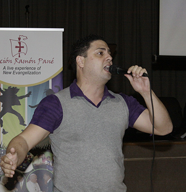 Johann Alvarez, a young Catholic Colombian songwriter sings at St. Rose of Lima Parish in Miami Shores after a New Evangelization conference from Mgr. Octavio Ruiz Arenas, Secretary of the Pontifical Council for Promoting the New Evangelization in February.