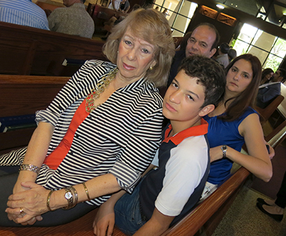 From left to right: Zuzel Echevarria, a parishioner of St. Kevin Church, with her family members: Alejandro Suarez, Marisol Padron Suarez and Jorge Suarez. They attended the memorial Mass for Echevarria's husband, who passed away last December.