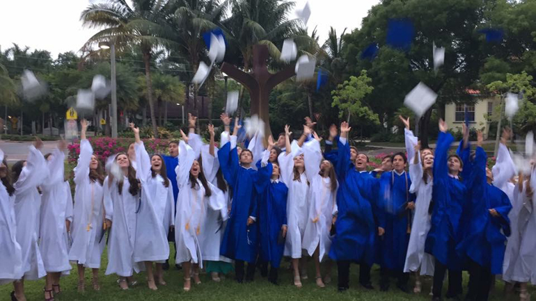 What's a graduation without a cap toss? Dressed in their caps and gowns, St. Agnes Academy eighth graders celebrated their graduation day.
