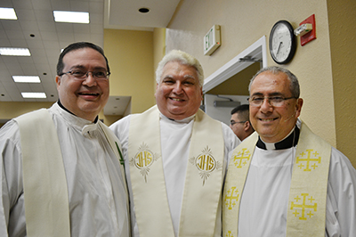 The 25th anniversary of St. Martin de Porres Church, in Leisure City, reunited its previous pastors. From left to right are: Father Carlos Vega, administrator at St. Martin de Porres from 2001-2010; Father Luis Rivera, founding pastor and pastor from 1990-1996[ and Father Joaquin Rodriguez, the current pastor as of 2010.