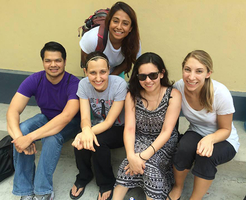 Members of the first team to Haiti pose for a photo at the Missionaries of Charity hospital complex in Port-Au-Prince. From left: Moises Pineda, Vanessa Santas, Liz Kraus, Blanca Morales and Kristen Morello.