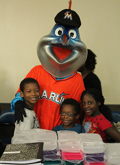 Billy the Marlin took the time to not only help out with the St. Mary Cathedral School back-to-school supply distribution, but also to pose with students.
