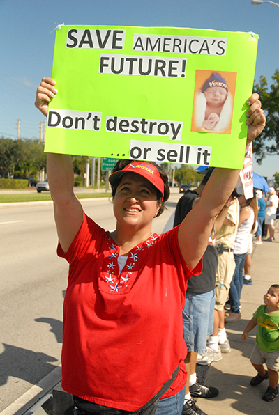 Hundreds of people protested against Planned Parenthood outside one of their clinics in Pembroke Pines, Saturday, Aug. 22, as part of nationwide revulsion to undercover videos put out by Center for Medical Progress. The videos show Planned Parenthood officials describing the harvesting of fetal tissues from aborted babies and discussing charges for the tissues.