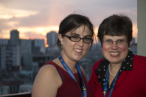 My daughter and I posing in front of a gorgeous Cuban sunset - the one thing that was truly taken away from my parents when they left the island.