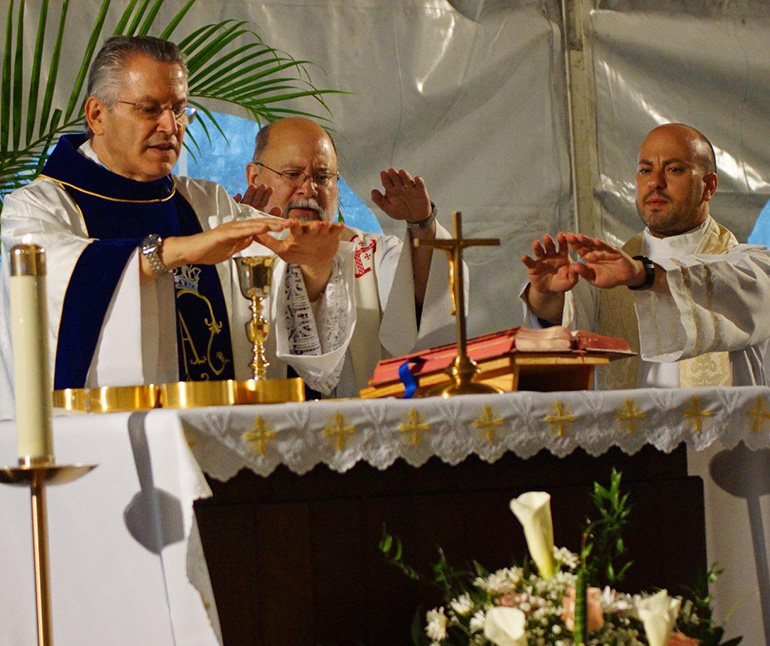 Concelebrating the Mass, from left: Msgr. Gabriel Ghanoum, coordinator of Spiritual Care for HCA Hospitals, SE Florida Division; Father Pedro Toledo of the Anglican Ordinariate, chaplain in Kendall; and Father Eric Zegeer, chaplain at Mercy.