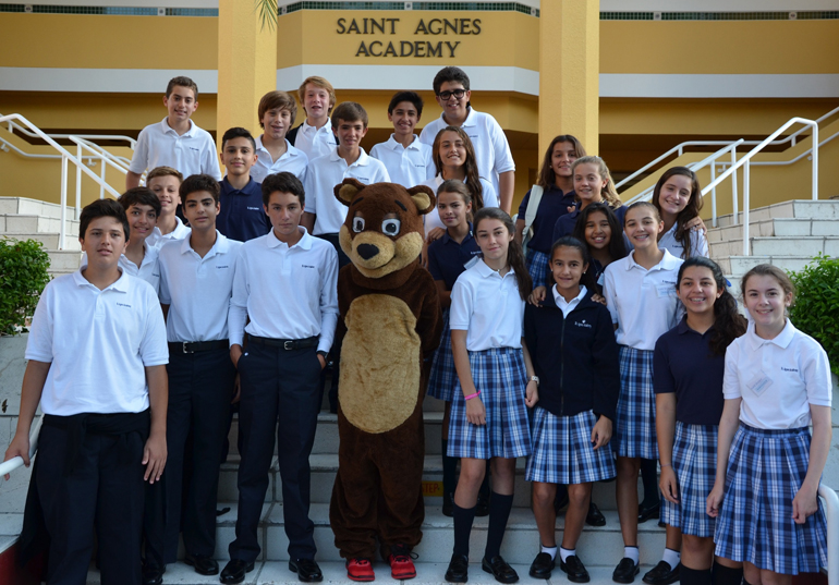 Ready to take on the new school year are St. Agnes Academy eighth grade students and school mascot, Nathan the Bear.