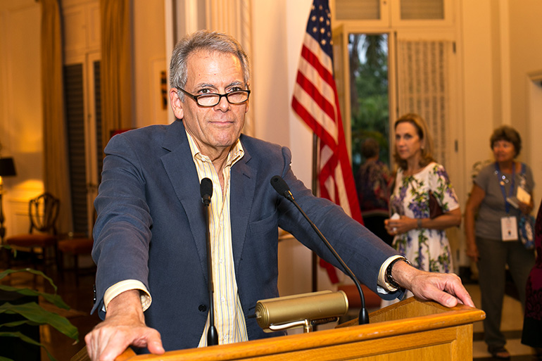 Ambassador Jeffrey DeLaurentis, chief of mission at the U.S. embassy in Havana, speaks to pilgrims from Miami and Boston during a reception at his residence in Havana.