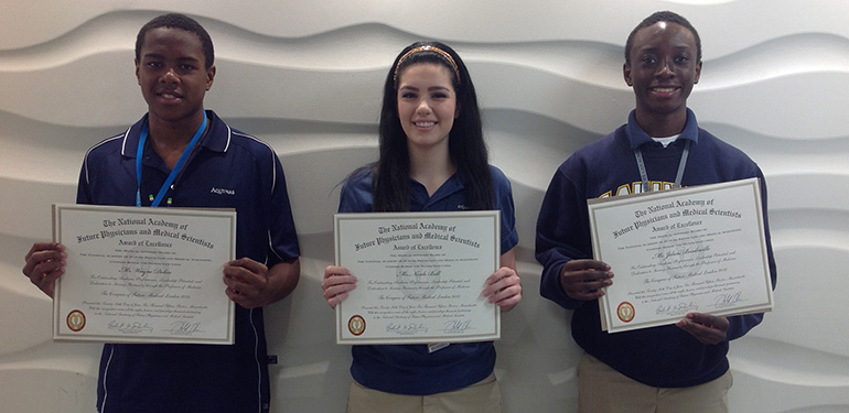 From left, St. Thomas Aquinas students Wayne Delice, Nicole Bell and Jelani Bardouille, who won Awards of Excellence while representing the state of Florida at the Congress of Future Medical Leaders in Boston over the summer.
