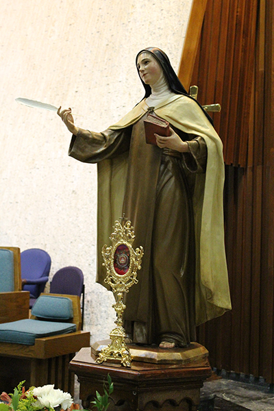 In celebration of the 500th anniversary of the birth of St. Teresa of Avila, an image of the saint, along with a relic, were brought out for the celebration Mass, which took place Oct. 15 at Immaculate Conception Church in Hialeah.