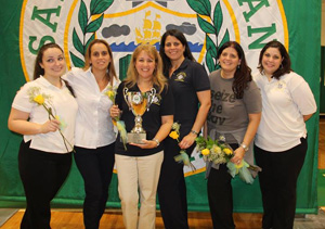 Champion trainers: Mother of Christ School teachers and faculty pose together at the Academic Olympics hosted at St. Brendan High. From left to right are Natalia Khawand, Beatriz Reynaldos, Principal Rita Rodriguez, Assistant Principal Yesy De La Torre, Emely Medina and Cristie Barbeite.