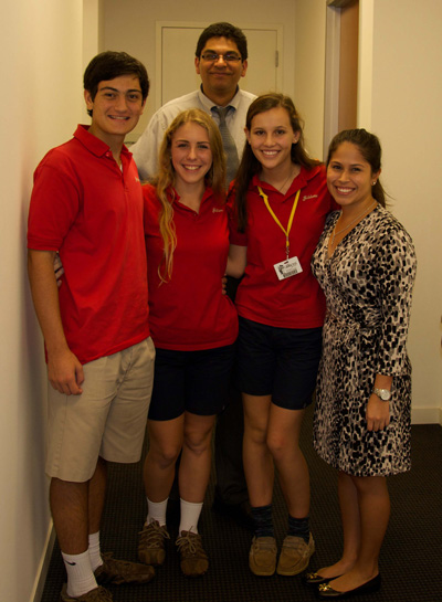 Cardinal Gibbons High seniors visited the office of U.S. Sen. Bill Nelson to advocate for climate change. In the photo, from left to right, are students Francesco Rizzo, Alexa Verburg and Juliette Selmeci, with Lauren Parra, Sen. Nelson's regional coordinator. In the back is Nelson Araque, Cardinal Gibbons' social justice instructor and a Catholic Climate Covenant ambassador.