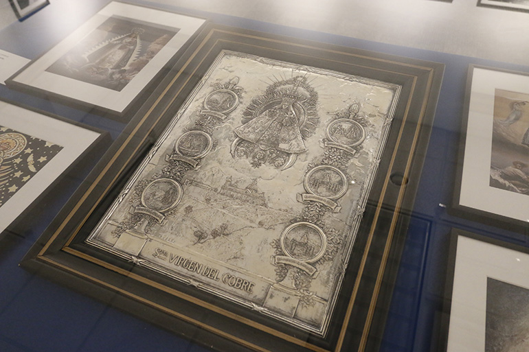An engraving depicting the history of the image of Our Lady of Charity since its appearance in the Bay of Nipe in Cuba is among the items on display as part of the "Latino Americans: 500 Years of History" exhibit at the Archbishop John C. Favalora Archive and Museum inside the St. Thomas University library.