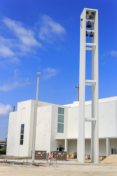 View of the bell tower and exterior of Our Lady of Guadalupe Church in Doral.