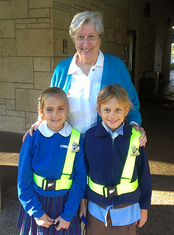 Sister Margaret Seitz, who died in October of this year, was one of eight religious of the Sacred Heart working in South Florida. She is seen here with two students from Carrollton School of the Sacred Heart in Coconut Grove.