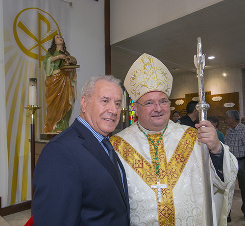 Bishop Peter Baldacchino poses with St. Mary Magdalen statue artist, Paolo Schiraldi, after the Mass.