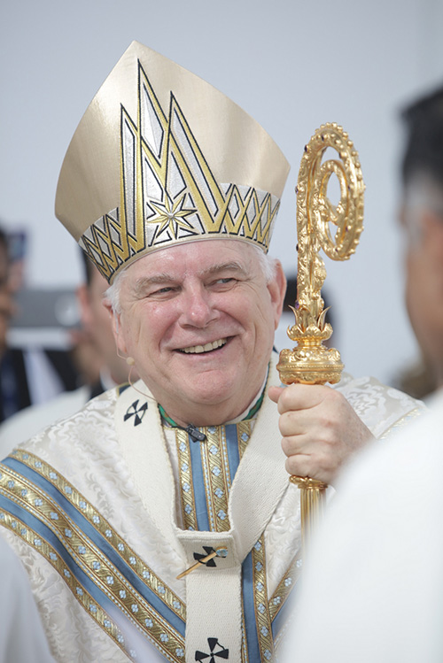 A joyous Archbishop Thomas Wenski prepares to begin the dedication Mass for Our Lady of Guadalupe Church in Doral.
