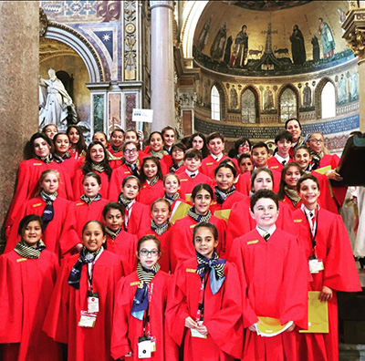 The St. Bonaventure Children's Chorale pose inside the Basilica of St. John Lateran in Rome.