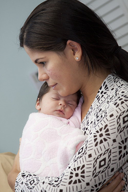 Fabiola Rojas received a $ 500 Heart of Christmas gift during the blessing ceremony for the Our Lady of Hope Expectant Respect Life Center in Hollywood. Rojas, who has been a client of the North Dade Pregnancy Help Center for the past four months, is holding her daughter Victoria Sofia, who was born in November.