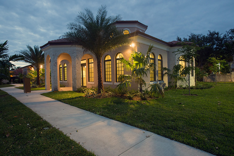 Exterior view of the new rectory-office building which echoes the architectural style of Assumption Church.