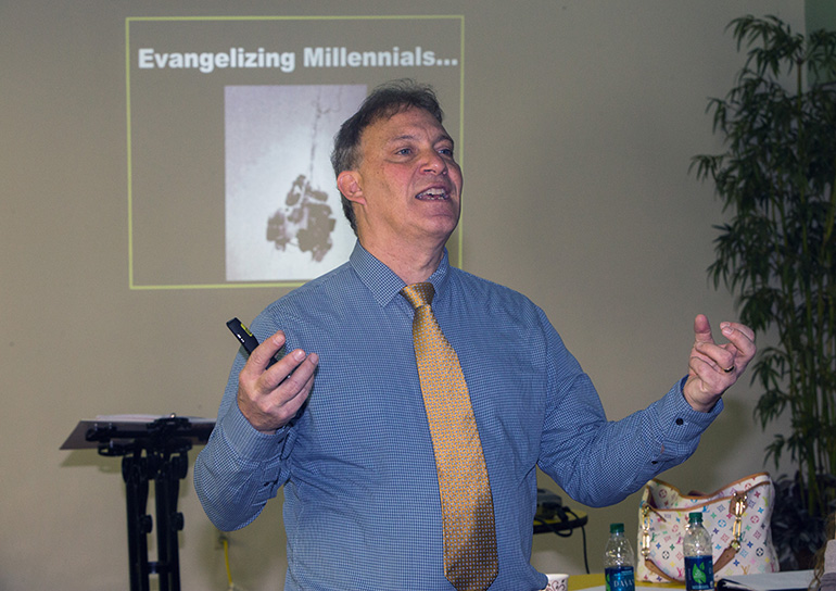 Frank Mercadante addresses youth ministers during a training workshop at the Pastoral Center.