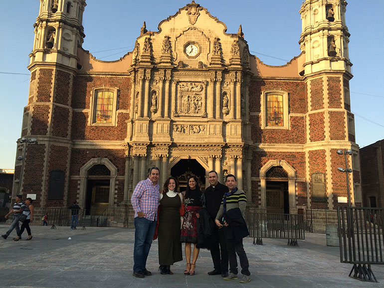 Standing outside the old basilica of Our Lady of Guadalupe in Mexico the day after Pope Francis' visit, from left: David Prada, director of the archdiocesan Office of Building and Property, and his wife, Liz; artist Nilda Comas; Father Israel Mago, pastor of Our Lady of Guadalupe Church in Doral; and Ruben Bravo, project manager for MCM Construction.