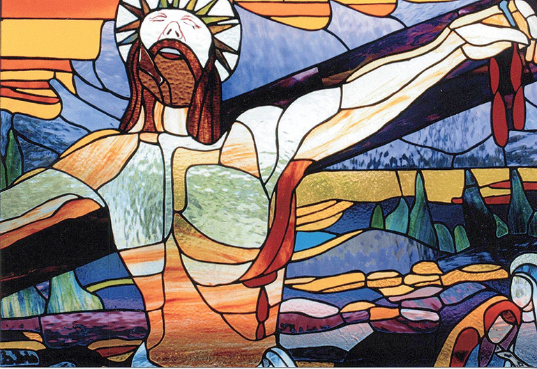 The crucifixion - a bloody spectacle - as depicted in a stained glass window at St. Bonaventure Church in Davie.