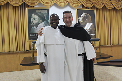 Dominican Father Eduardo Logiste Félix, left, pastor of St. Dominic Church, Miami, poses with fellow Dominican Father José David Padilla after the latter's conference on the life of St. Dominic, in honor of the 800th anniversary of the founding of the Order of Preachers.