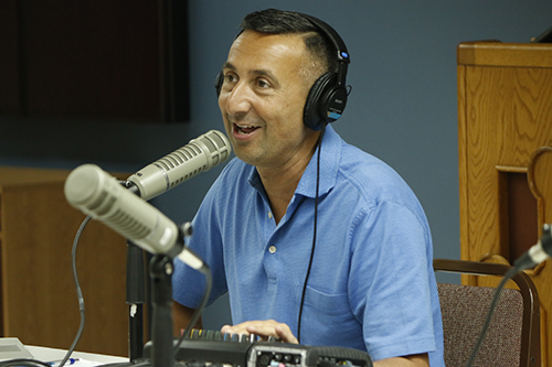 The Catholic Guy on SiriusXM Radio, Lino Rulli, cracks a joke during his March 1 broadcast from the archdiocesan Pastoral Center in Miami.