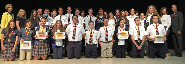 Pictured are the winning Immaculate Conception students along with Msgr. Edward Pace High's principal, Ana Garcia; Immaculate Conception Principal Victoria Leon; Assistant Principal Michelle Roof; and Pace’s Eduardo Flor; along with Immaculate's seventh and eighth grade teachers: Anette Novo, Bianca Acosta, Ann Clay, Deacon Louis Phang-Sang, Kathy Callow and Rebecca Garces.