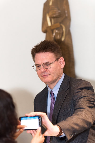 Philadelphia-based licensed clinical and family therapist Peter Kleponis shows a smartphone - which he says young children should not have - to one of the 70 participants in his workshop on internet pornography and addictions which took place recently at St. Gregory the Great Parish in Plantation.