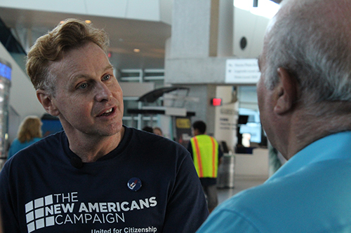 Randolph McGrorty, executive director of Catholic Legal Services of the Archdiocese of Miami, takes a moment to answer questions from the press during the Miami New Americans Campaign Mega Citizenship Day workshop.