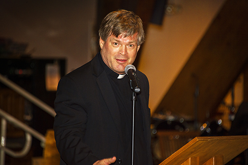 Father Steven O’Hala, pastor of St. David Church, speaks at the Nehemiah Assembly.