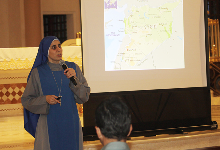 Sister Maria de Guadalupe Rodrigo, an Argentine missionary who has lived in Aleppo, Syria, since 2011, shares her experiences of war and persecution of Christians there during a visit to St. Patrick Church, Miami Beach.