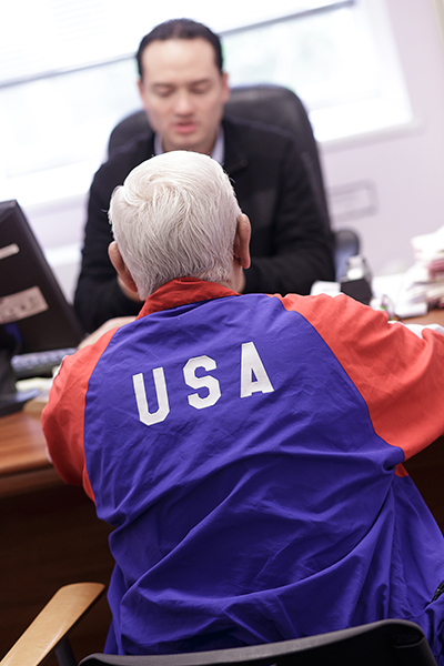 Dante Ledenchy, a Catholic Legal Services paralegal, meets with a client seeking help with immigration matters.