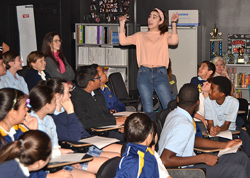 During one of the skits, Brianna Eljaua leads the middle-school crowd in a song with the Maverick Players.