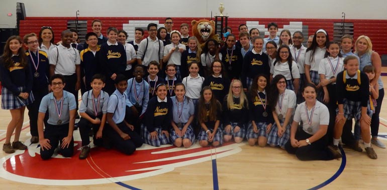 Victory shot: Students from Nativity School pose for a group shot after winning first place at the Scholastic Competition hosted by Chaminade-Madonna College Preparatory April 23.