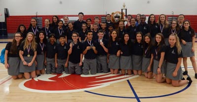 Students from St. Gregory School pose for a group shot after winning second place at the Scholastic Competition hosted by Chaminade-Madonna College Preparatory April 23.