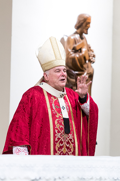 Archbishop Thomas Wenski says some parting words at the conclusion of the 27th annual Red Mass for the St. Thomas More Society of South Florida, celebrated June 9 at St. Anthony Church in Fort Lauderdale. Local lawyers, judges and other legal professionals were on hand for the Mass.