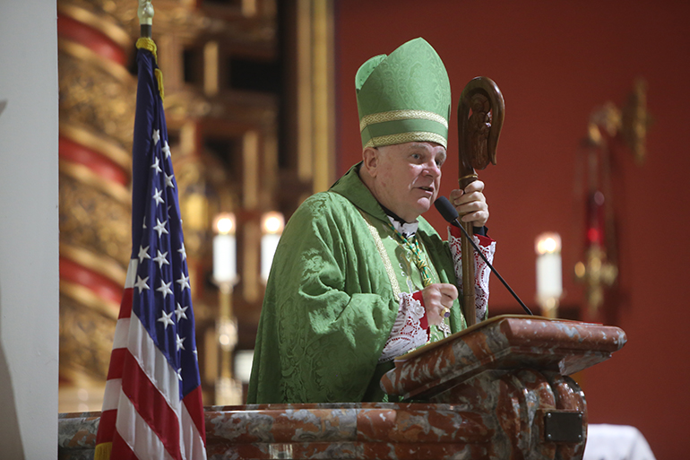 Archbishop Thomas Wenski preaches the homily during the Mass at Little Flower Church where the relics of St. Thomas More and St. John Fisher were venerated, kicking off the Fortnight of Freedom in the archdiocese.