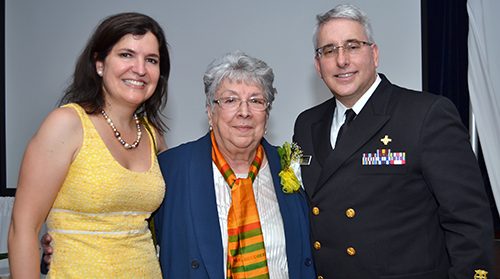 Sister Vivian Gomez, center, poses with St. Jerome alumni and doctors Giselle Ghurani and Richard Childs.