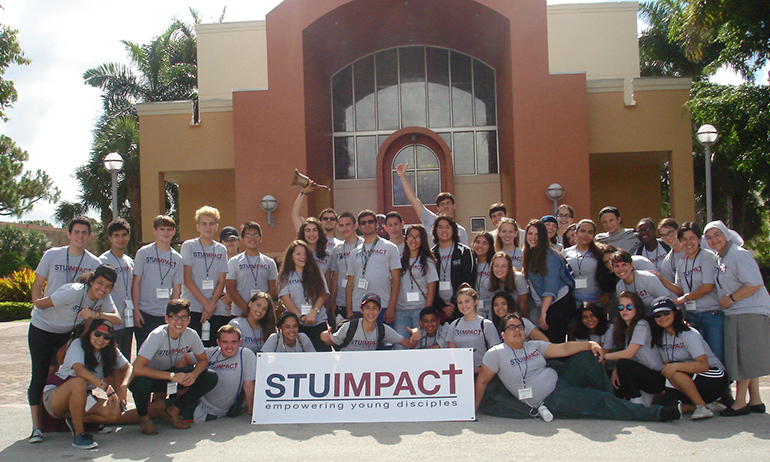 STU Impact students pose for a group photo outside of the St. Thomas University chapel. From June 17-24 students lived on campus and participated in the STU Impact summer theology institute.