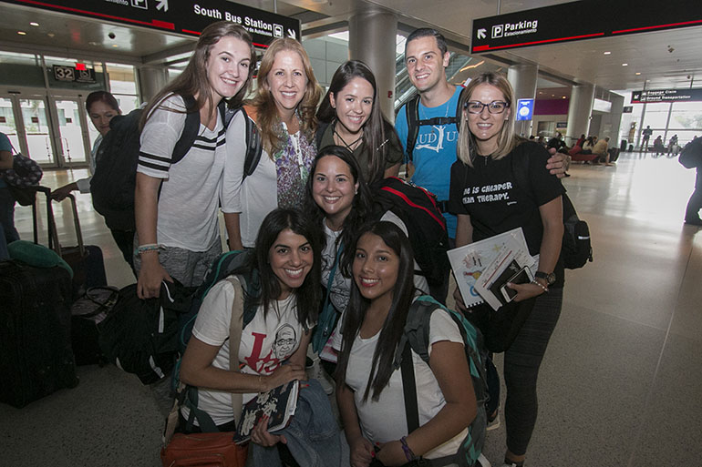 The group from Little Flower Parish in Coral Gables poses for a photo before heading through airport security. Carolina Vizcaino is right in the middle of the group.