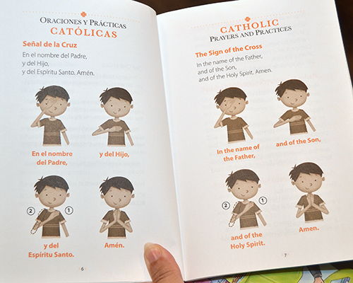 Booklet at the Rel Ed Expo shows how to teach a child the sign of the cross.