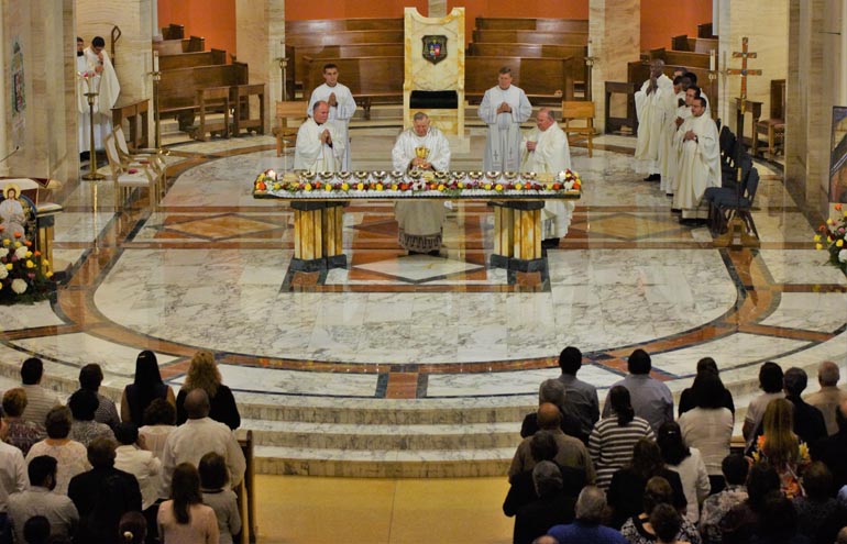 Photographer: SR. ELIZABETH WORLEY
Archbishop Thomas Wenski during Consecration at Mass for the repose of the soul of the co-initiator of the Neo Catechumenal Way.