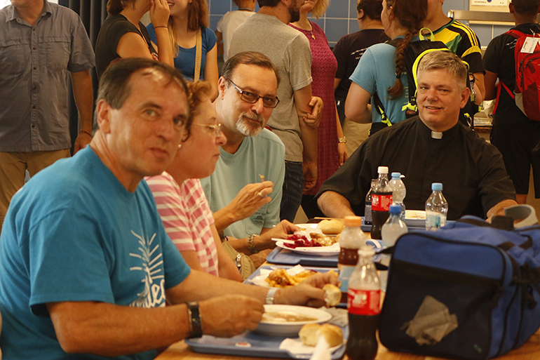 Having lunch at one of the cafeterias in Jasna Gora: Father Jeff McCormick, pastor of St. Maximilian Kolbe in Pembroke Pines (far right). He traveled to World Youth Day with a group of nine teens and five young adults. From left, the adult chaperones, members of the parish's LifeTeen board: Rodolfo and Susan Gonzalez-Llanos and Scot Campbell (his wife Sue is hidden from view.)