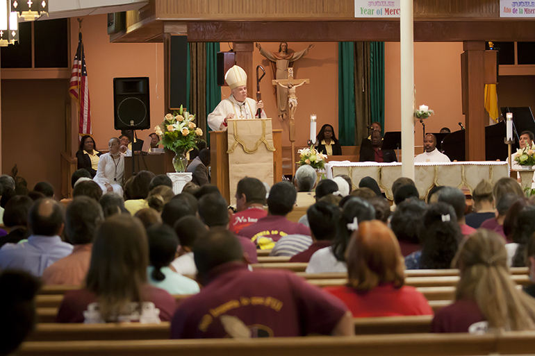 Archbishop Thomas Wenski preaches the homily at the 60th anniversary Mass for St. Stephen Church in Miramar.
